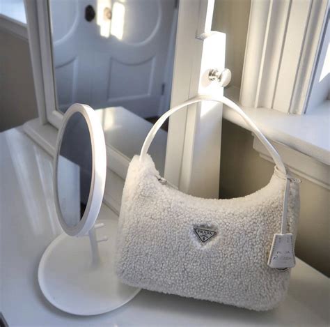 prada white fluffy bag|Prada purses.